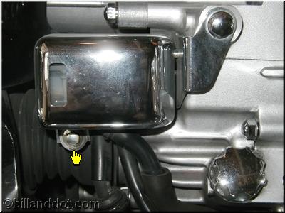 Rear Brake Reservoir Cover (Pointer Indicates Bolt)